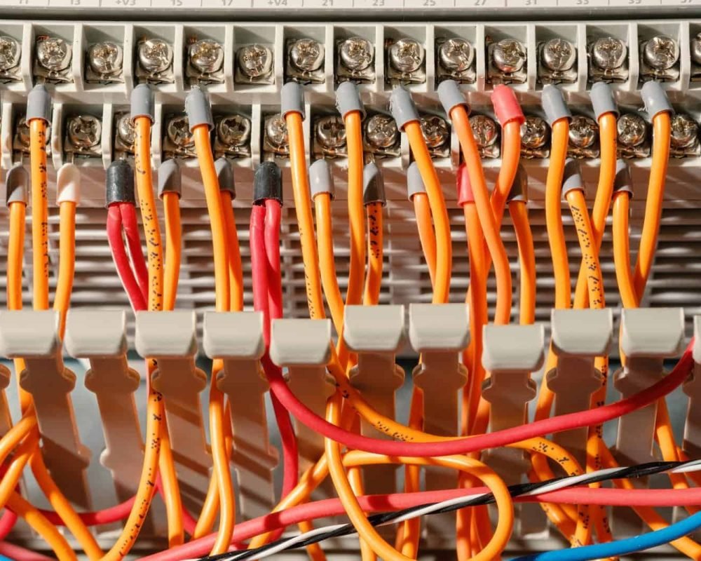 Multi-colored wires connected to the terminals close-up